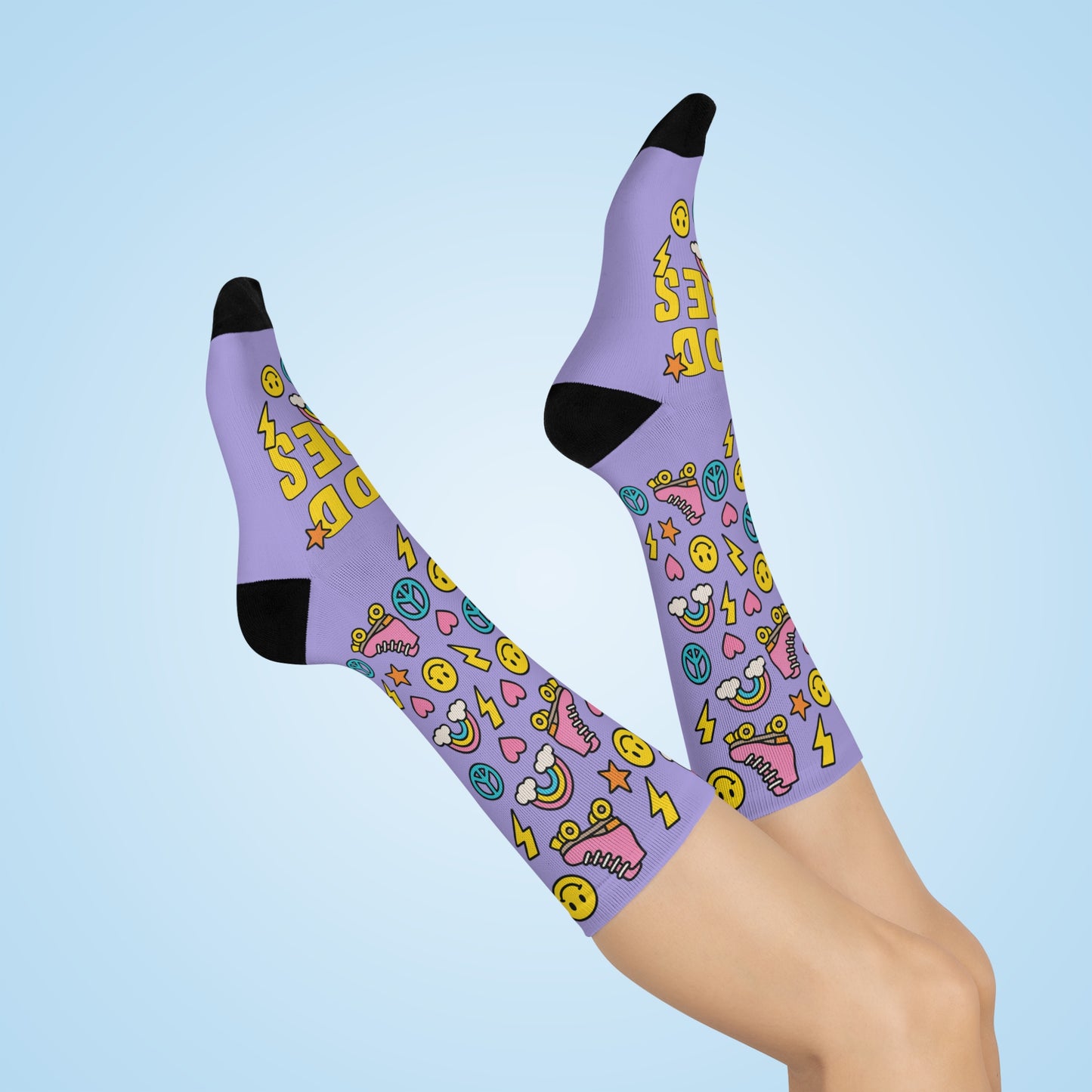 Purple socks with colorful patterns on a light blue background