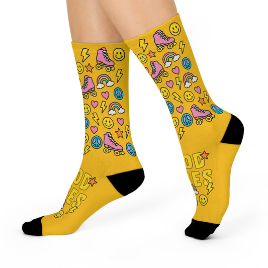 Yellow socks with colorful patterns on a white background