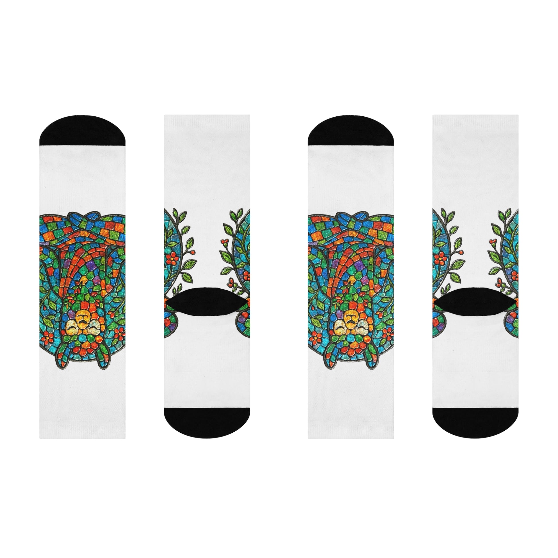 Four socks with colorful llama designs on a white background