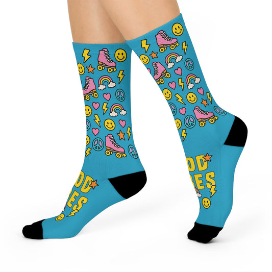 Blue socks with colorful patterns and text on a white background