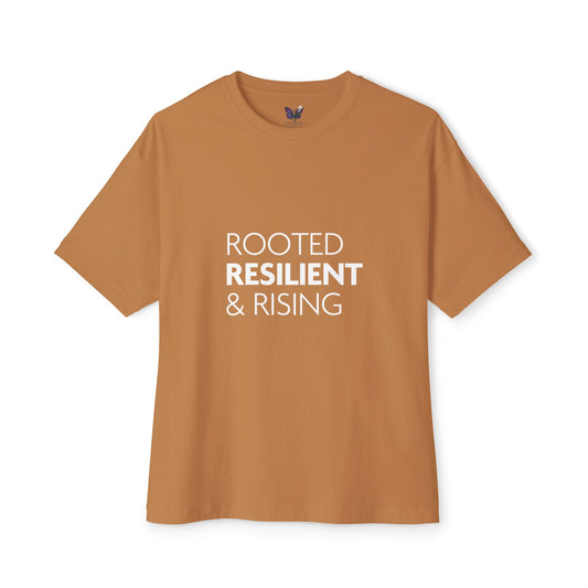 Brown t-shirt with 'ROOTED RESILIENT & RISING' text on a white background