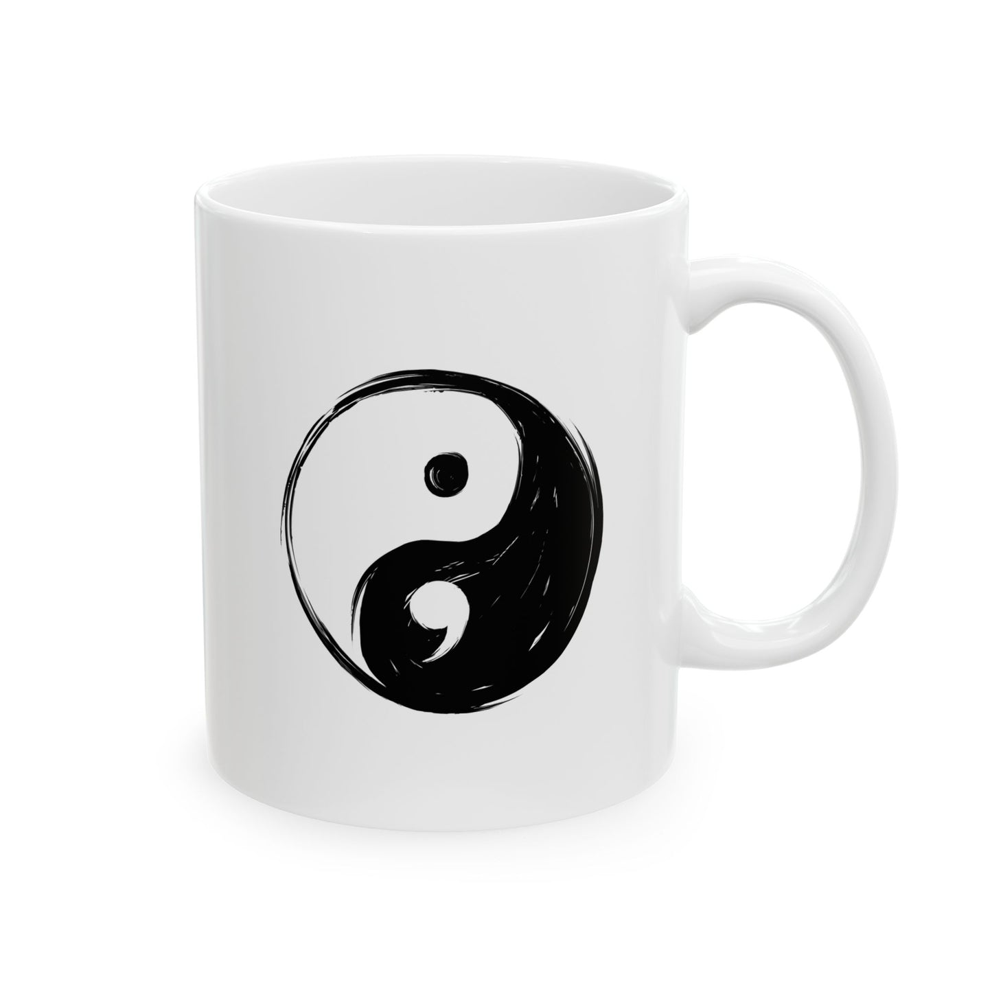 White mug with a black yin yang symbol on a white background