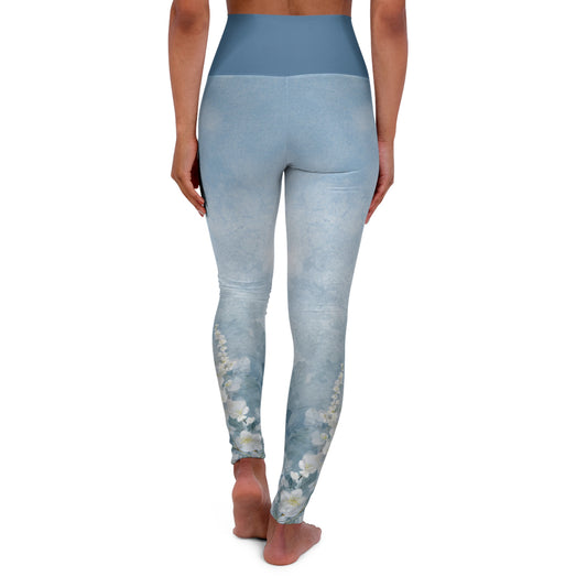 Light blue floral leggings worn by a person on a white background