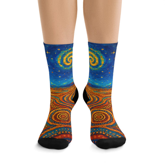 Colorful spiral patterned socks on a white background
