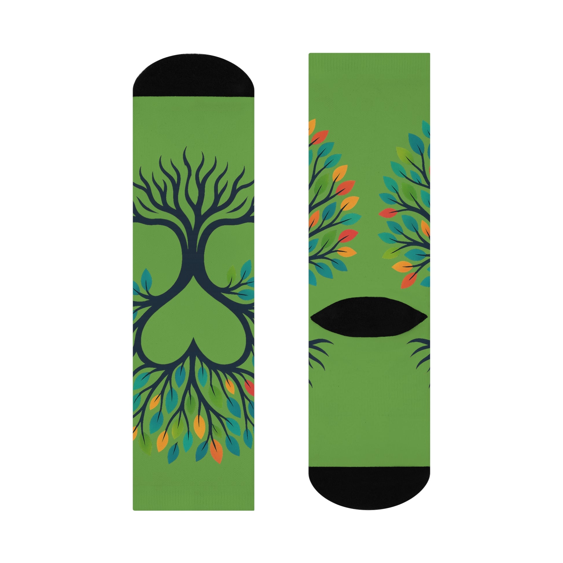Green socks with tree design on a white background