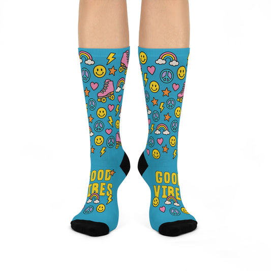 Blue knee-high socks with colorful patterns and text on a white background