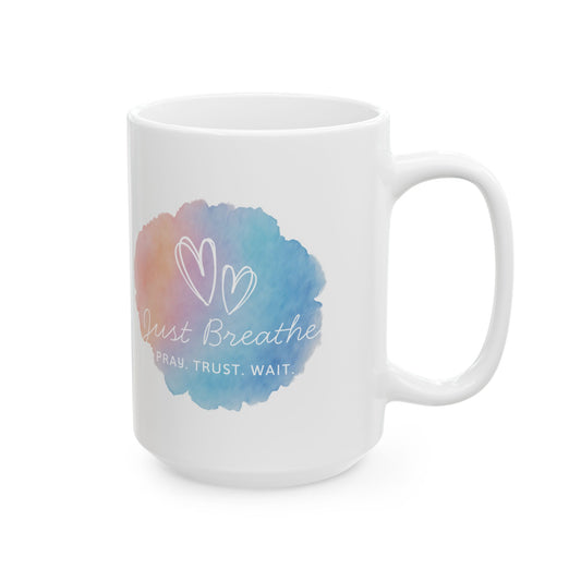 White mug with a colorful watercolor design and text on a white background