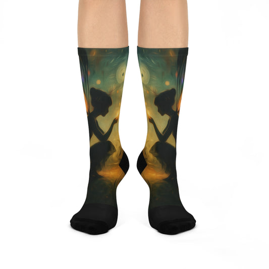 Knee-high socks with a silhouette design of a person playing a guitar on a white background